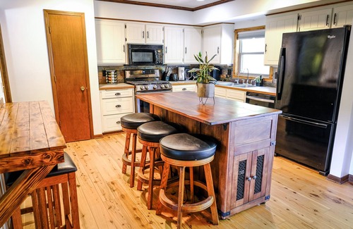 West Omaha House | Top-Rated Omaha Getaway with EV Charger & Hot Tub