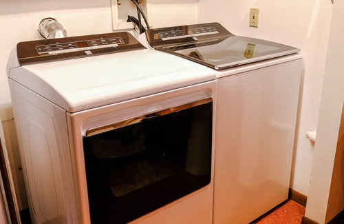 West Omaha House | Top-Rated Omaha Getaway with EV Charger & Hot Tub