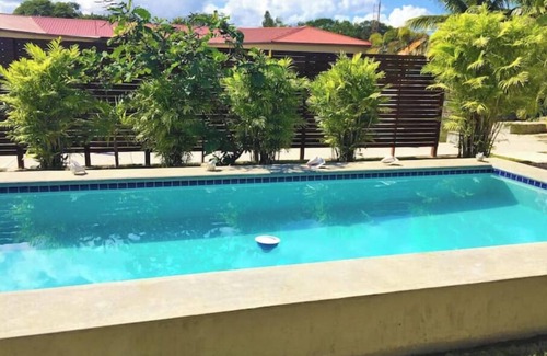 Corozal Apartment | Entire House, Privacy, Pool, Canal, Ocean Views, Kitchen, AC's, Dock, Sleeps 9