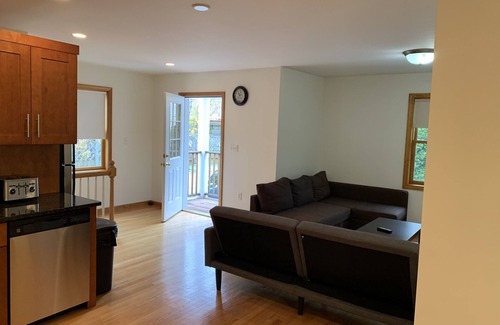 Allston Apartment | Top-Rated Two-Bed Rental with Parking and Breakfast Included