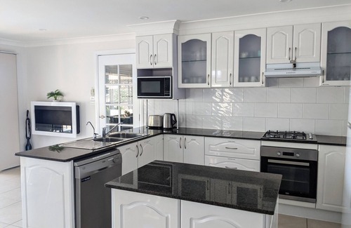 Forster House | Waterfront Retreat: Grand Riviera Forster with Pool & Views
