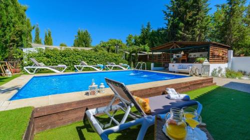 Chauchina House | Experience Casa Entreolivos: 4-Star Oasis with Pool