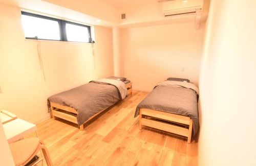 Tamano Apartment | Family-Friendly Stay at Enzo Due for Budget Travelers