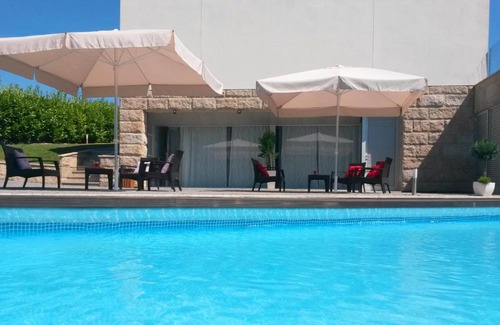 Santo Tirso Cabin | Equinaturi: Oceanfront Oasis with Pool & 9/10 Guest Rating