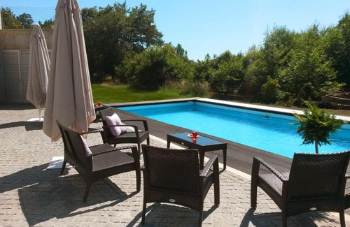Santo Tirso Cabin | Equinaturi: Oceanfront Oasis with Pool & 9/10 Guest Rating