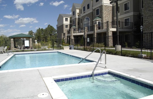 Northwest Colorado Springs Condo | Equipped Suite with Seasonal Outdoor Pool Access! Housekeeping + Business Center