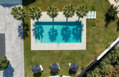 Totalan House | Discover Era del Puerto: Family-Friendly Getaway with Pool