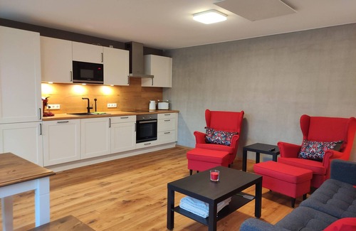 Wiesentheid Apartment | Exceptional Erdhausapartment West with Pool and Lake Views