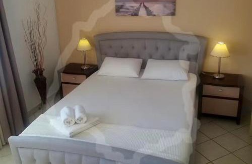 Chrisi Akti Apartment | Discover Eric's Apartment: Oceanfront Retreat with Pool