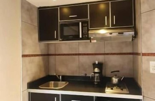 Yocsina Villa | Discover Ernestina Village: Pet-Friendly with Pool & Spa