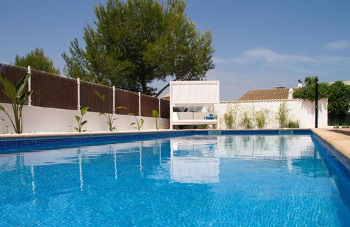 Son Serra de Marina Ski Chalet | Experience Es Bon Patro: 4-Star Excellence with Pool Access