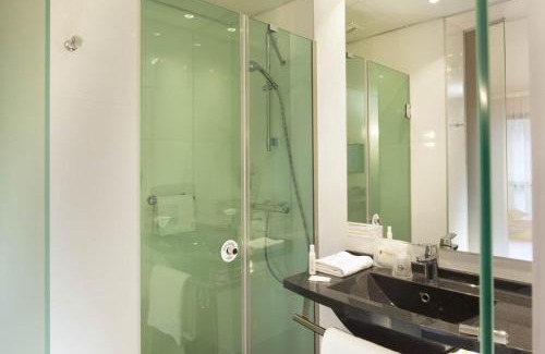 Bouguenais Hotel | Discover Escale Oceania Nantes Aéroport with Pool & Pet Perks