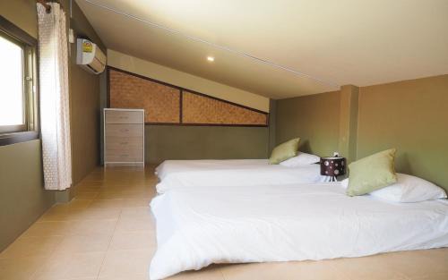 Ko Lanta Apartment | Oceanfront Escape-Cabins with Pool & Family-Friendly Vibes