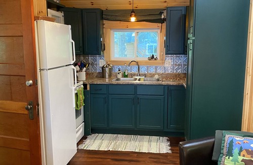 Squaw Lake Cabin | Cozy Lakefront Cabin Retreat with Ocean Views and More