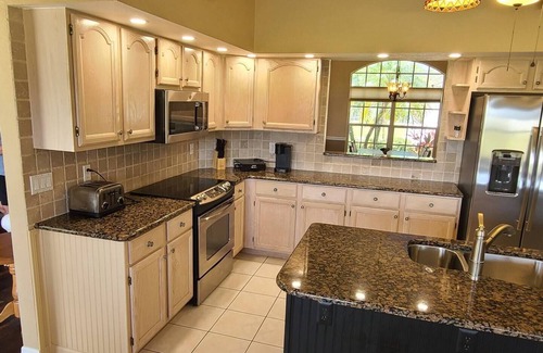 Broadmoor House | Escape to our stunning waterfront vacation rental pool home in Rotonda West, FL