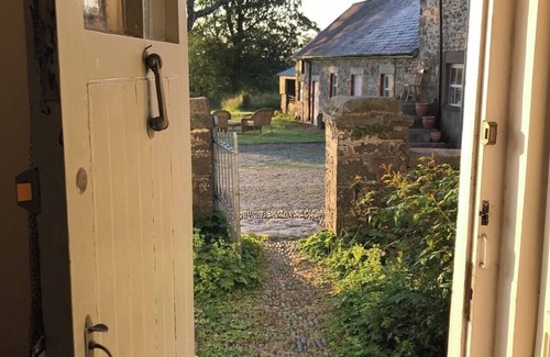 New Quay House | Escape to Panteg, a charming coastal retreat that blends traditional character with modern comfort,