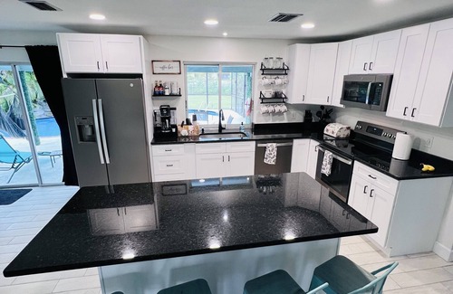 Fort Myers Shores House | Discover Sunshine Bliss: Ocean View Retreat with Heated Pool
