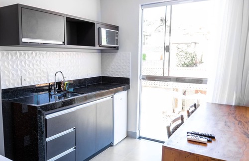 Capitolio Hotel | Discover Escarpas Eco Village: Family-Friendly Retreat with Pool