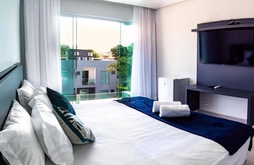 Capitolio Hotel | Discover Escarpas Eco Village: Family-Friendly Retreat with Pool