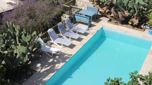 Old Datca Hotel | Eski Datça Pansiyon: Oceanfront Stay with Pool & Dining