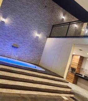 Trindade House | Espaço Frente ao Lago