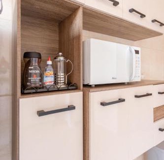 Regiao Urbana Homogenea X Apartment | Tranquil Getaway with Balcony and Spa Amenities