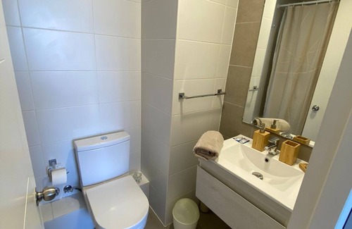 San Pedro de la Paz Apartment | Stylish Espacio Urbano: Relaxing Hot Tub & Spa Amenities