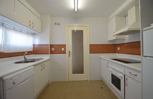 Punta del Moral Apartment | Espigon Central 11: Pet-Friendly Apartment with Pool Access