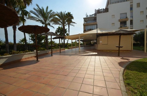 Punta del Moral Apartment | Espigon Central 11: Pet-Friendly Apartment with Pool Access