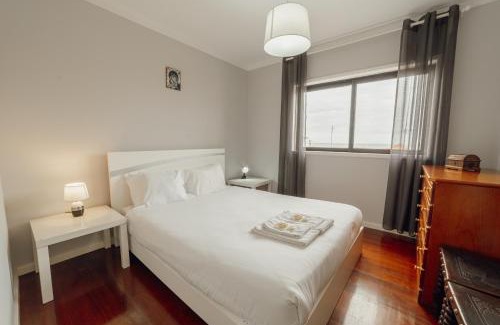 Espinho Apartment | Espinho Seawalk and Seaview by Vacationy