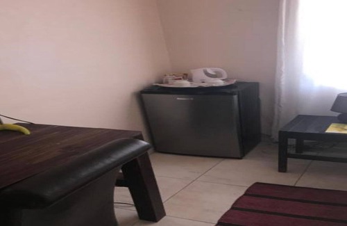 Windhoek House | Explore Essence of Africa Guesthouse: Family and Pet-Friendly