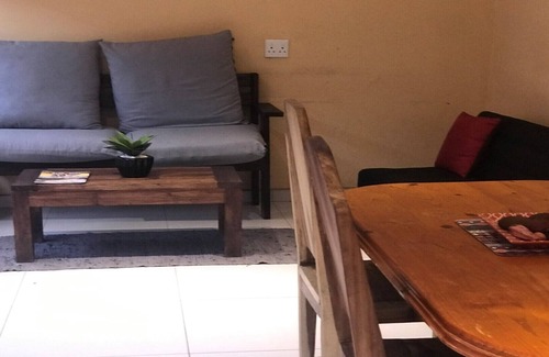 Windhoek House | Explore Essence of Africa Guesthouse: Family and Pet-Friendly