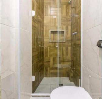 Pitangueiras Apartment | Modern Studio Steps from the Beach with Free Wi-Fi & Garage