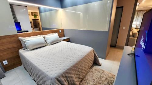 Jardim dos Estados Apartment | Stylish Vertigo Studio with Smart TV and Pool Access
