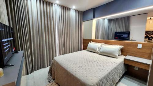 Jardim dos Estados Apartment | Stylish Vertigo Studio with Smart TV and Pool Access