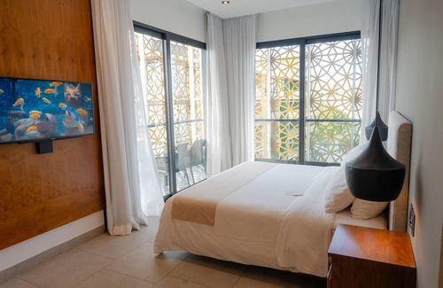Luis Donaldo Colosio Hotel | Steps Away from Martina Beach Club & Fifth Avenue Vibes