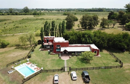 Capilla del Senor House | Experience Estancia LA AIDA: Pet-Friendly Retreat with Pool