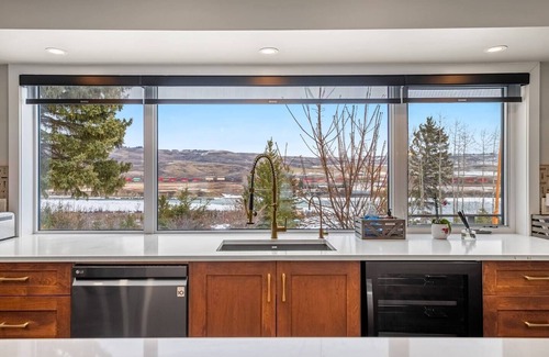 Springbank House | Inviting Estate on Bow River: Family-Friendly with Kitchen