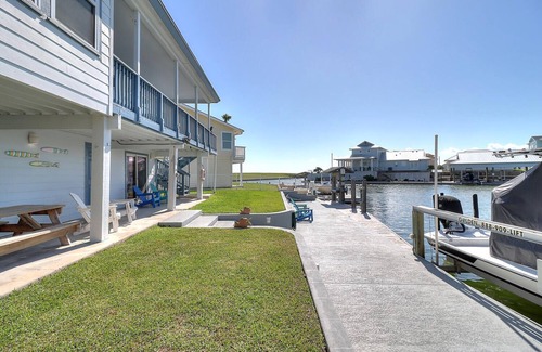 City-by-the Sea House | Estes Oasis: Canal Front Home with Dock & Game Room Fun