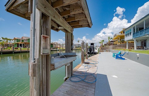 City-by-the Sea House | Estes Oasis: Canal Front Home with Dock & Game Room Fun