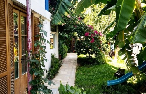 Tigre Apartment | Cozy Studio Retreat with Beautiful Garden & Spa Access
