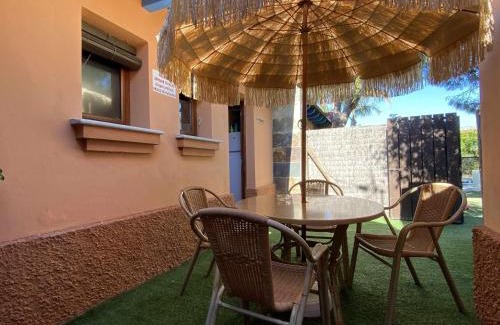 El Palmar Apartment | Cozy Studio with Private Garden, Barbecue & Pool Access