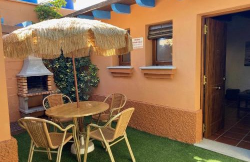 El Palmar Apartment | Cozy Studio with Private Garden, Barbecue & Pool Access