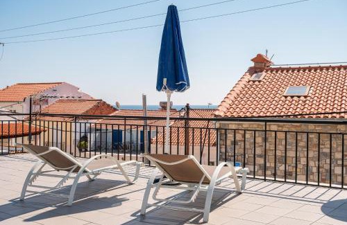 Pythagorion Apartment | Prime Oceanfront Apartment Steps from Remataki Beach