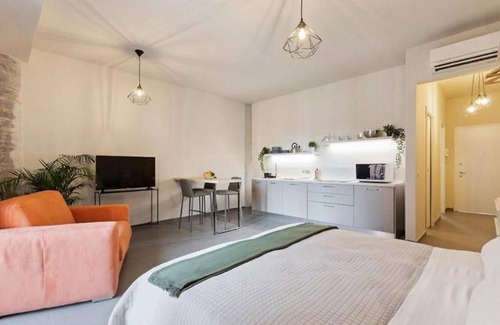 Borgo-Sanzio Apartment | Stylish Etna Suite Design Apartments with Family-Friendly Amenities