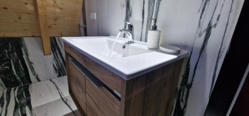 Republika Srpska Ski Chalet | Relax at Etno Selo: Pet-Friendly Oasis with Ocean Views