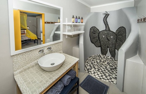 Okaukuejo Cabin | Explore Etosha Safari Camp: Family-Friendly Retreat with Pool