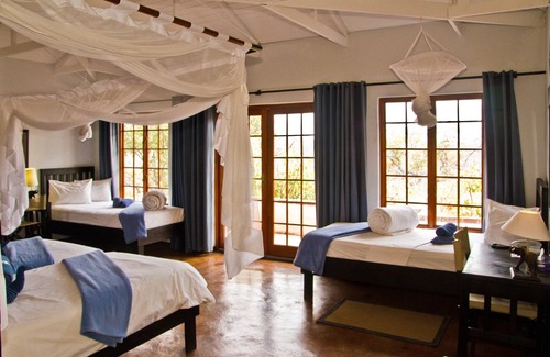 Okaukuejo Cabin | Experience Etosha Safari Lodge: Family-Friendly Retreat