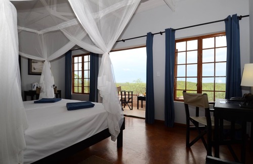 Okaukuejo Cabin | Experience Etosha Safari Lodge: Family-Friendly Retreat