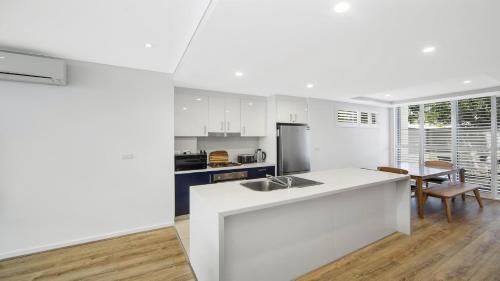 Ettalong Beach Apartment | Relaxing Stay at Ettalong Beach with Poolside Amenities